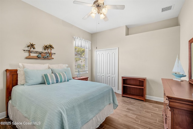 5770 Mascaro Ct, Melbourne, FL 32940 - bedroom with a closet, wood finished floors, baseboards, and a ceiling fan