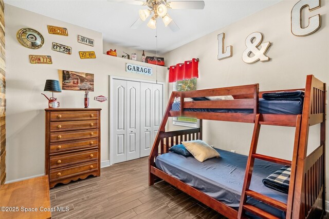 5770 Mascaro Ct, Melbourne, FL 32940 - bedroom featuring wood finished floors, a closet, baseboards, and ceiling fan