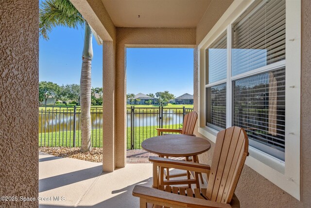 5770 Mascaro Ct, Melbourne, FL 32940 - view of patio / terrace with a water view and a residential view
