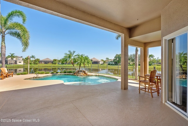 5770 Mascaro Ct, Melbourne, FL 32940 - view of pool featuring a patio area, a water view, and a residential view