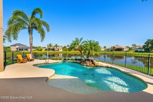 5770 Mascaro Ct, Melbourne, FL 32940 - view of pool with a residential view, a fenced backyard, a patio area, and a water view