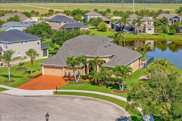 5770 Mascaro Ct, Melbourne, FL 32940 - aerial view of residential area with a large body of water