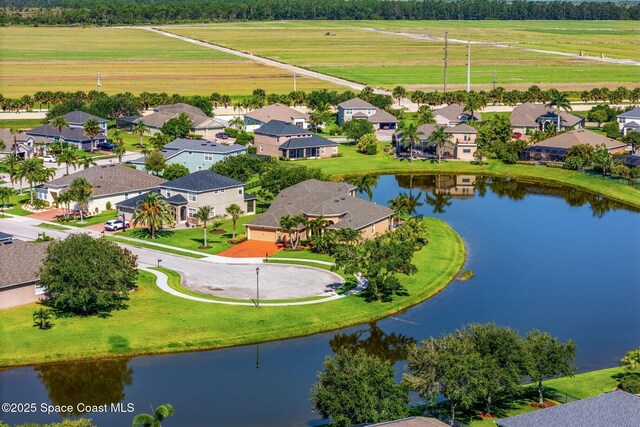 5770 Mascaro Ct, Melbourne, FL 32940 - aerial perspective of suburban area featuring a large body of water