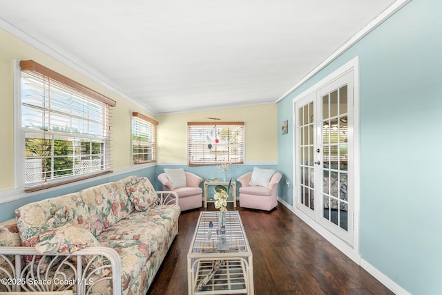 living room with french doors, baseboards, ornamental molding, and hardwood / wood-style flooring