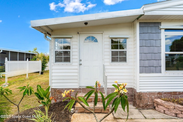 entrance to property with fence