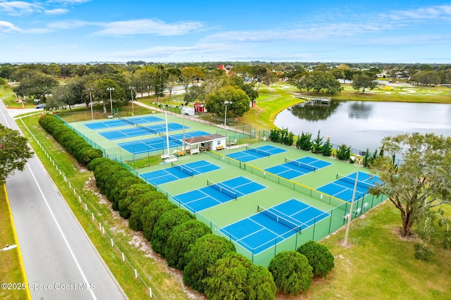 birds eye view of property featuring a water view