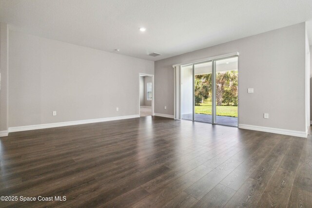 780 Geddes St SW, Palm Bay, FL 32908 - unfurnished room featuring dark wood finished floors, baseboards, and recessed lighting