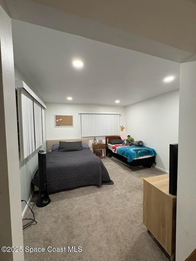 carpeted bedroom with recessed lighting and baseboards