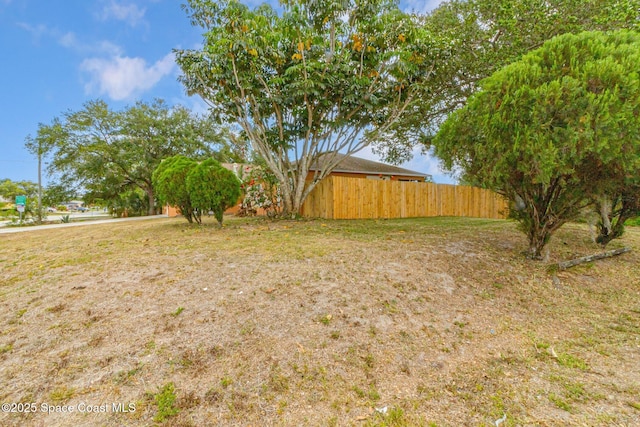 view of yard featuring fence