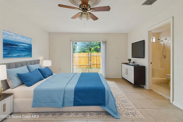 bedroom featuring access to exterior, connected bathroom, light tile patterned floors, ceiling fan, and baseboards