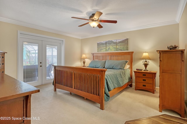 bedroom with light carpet, access to outside, french doors, and crown molding