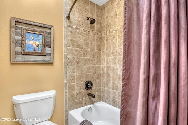 bathroom with toilet and shower / bathtub combination with curtain