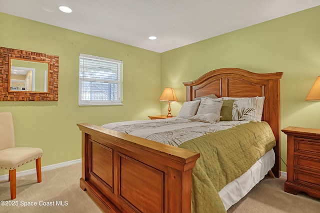 bedroom featuring baseboards, recessed lighting, and light colored carpet