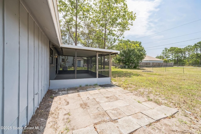 1680 Travis St SE, Palm Bay, FL 32909 - view of patio / terrace featuring a sunroom