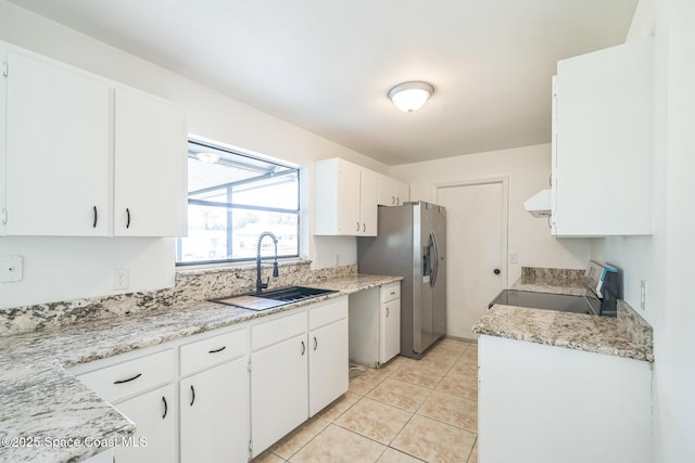 1680 Travis St SE, Palm Bay, FL 32909 - kitchen featuring electric range oven, a sink, stainless steel fridge, exhaust hood, and light countertops