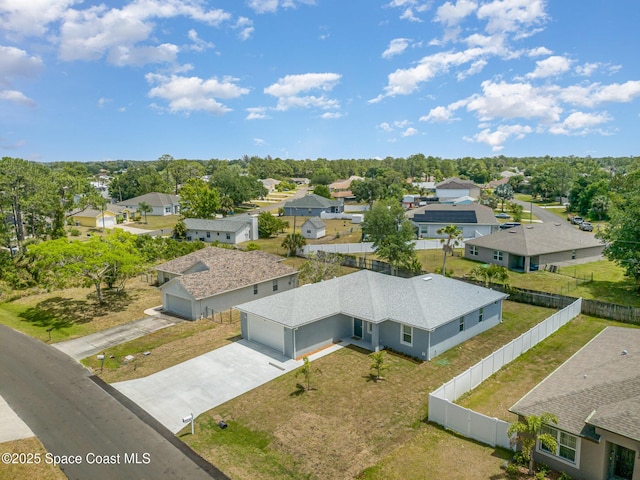 drone / aerial view with a residential view