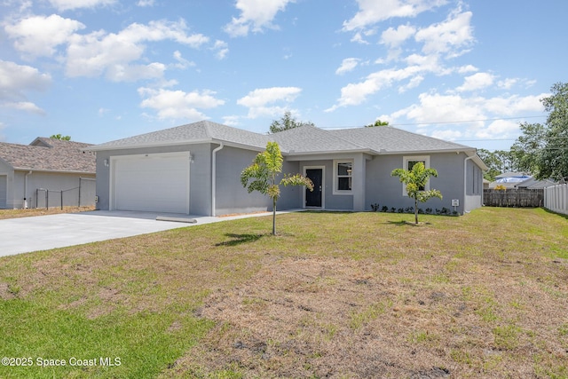single story home featuring fence, an attached garage, driveway, stucco siding, and a front lawn