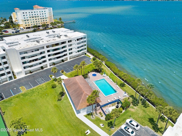 5011 Dixie Hwy NE Unit A312, Palm Bay, FL 32905 - drone / aerial view of a pool and a nearby body of water
