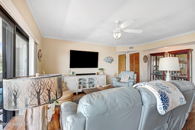 5011 Dixie Hwy NE Unit A312, Palm Bay, FL 32905 - living room featuring crown molding, wood finished floors, and a ceiling fan