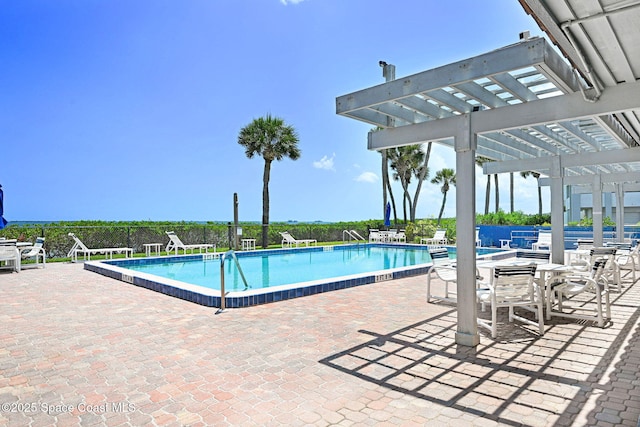 5011 Dixie Hwy NE Unit A312, Palm Bay, FL 32905 - community pool featuring a pergola, fence, and a patio area