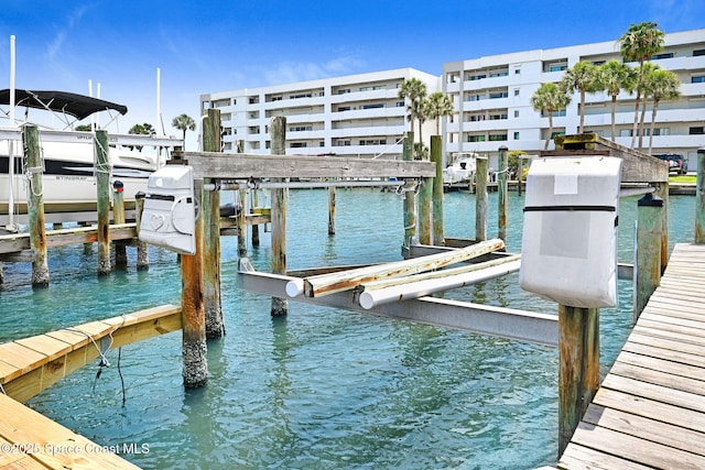5011 Dixie Hwy NE Unit A312, Palm Bay, FL 32905 - dock featuring boat lift and a water view