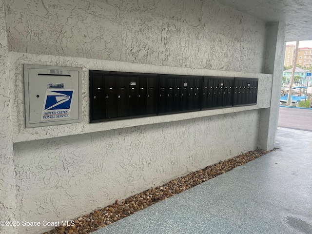 5011 Dixie Hwy NE Unit A312, Palm Bay, FL 32905 - exterior view of mail area and stucco siding