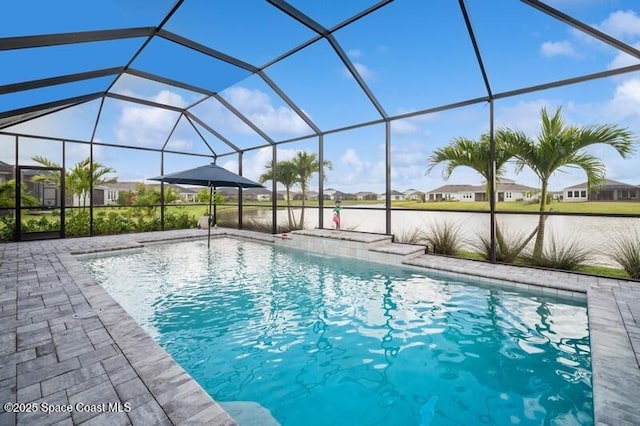 2979 Pangea Cir, Melbourne, FL 32940 - outdoor pool with a patio, glass enclosure, and a residential view