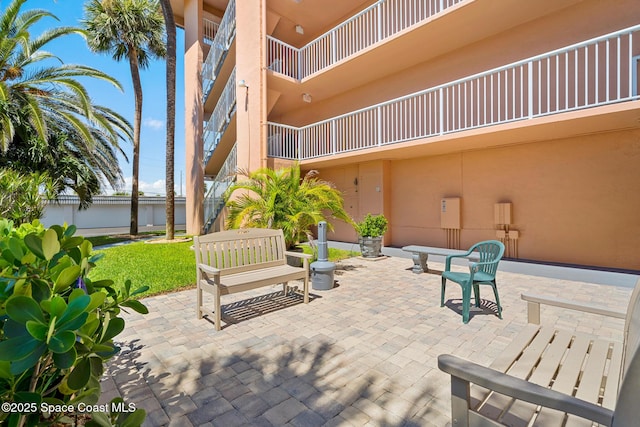 surrounding community with a patio