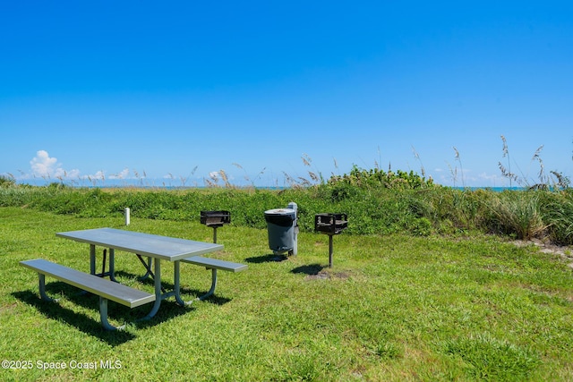 surrounding community with a lawn