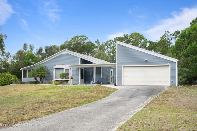 2530 State St, Melbourne, FL 32904 - mid-century inspired home with driveway, a garage, and a front lawn