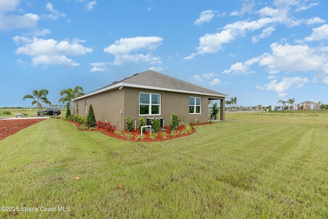 view of property exterior featuring a yard and stucco siding