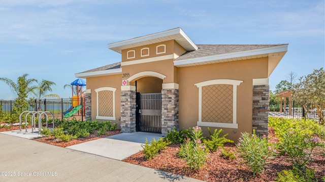 view of community featuring fence