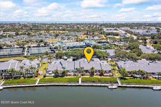 505 Tradewinds Dr, Indian Harbour Beach, FL 32937 - drone / aerial view featuring a water view and a residential view