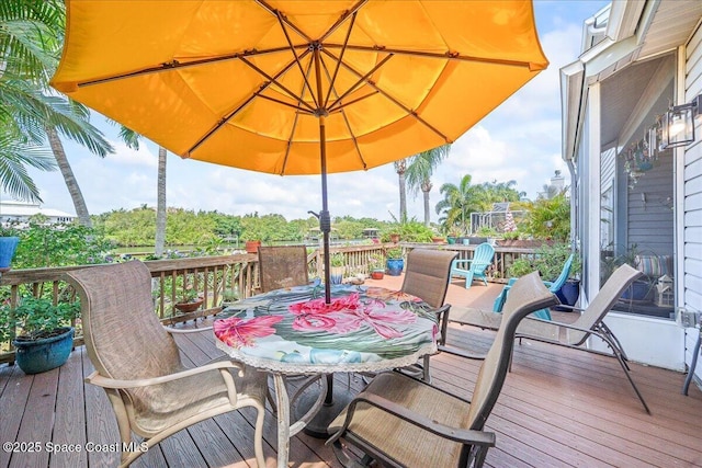 505 Tradewinds Dr, Indian Harbour Beach, FL 32937 - deck with outdoor dining area
