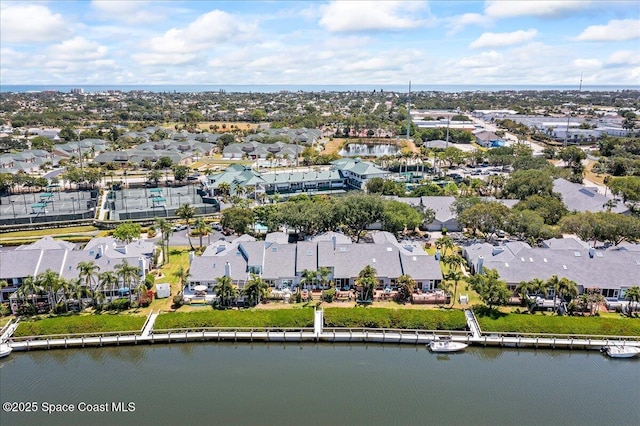 505 Tradewinds Dr, Indian Harbour Beach, FL 32937 - drone / aerial view featuring a water view and a residential view
