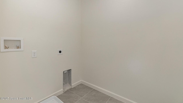laundry area with baseboards, light tile patterned floors, hookup for a washing machine, hookup for an electric dryer, and laundry area
