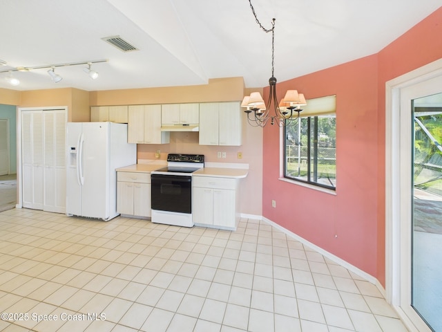 kitchen with an inviting chandelier, white fridge with ice dispenser, under cabinet range hood, light countertops, and range with electric stovetop