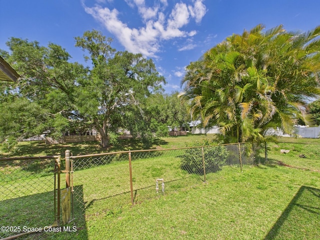 view of yard featuring fence