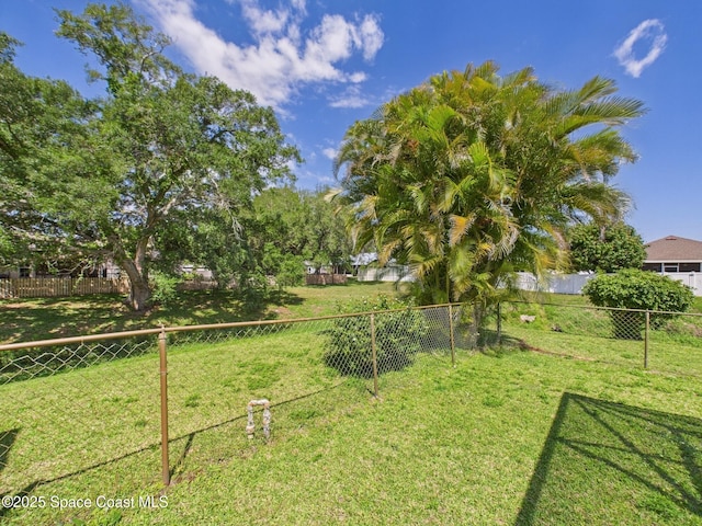 view of yard with fence