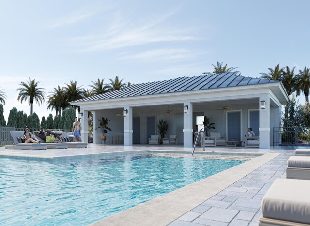 community pool with a patio area, ceiling fan, outdoor lounge area, and fence