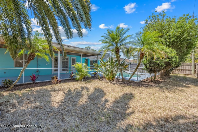 619 Dinner St NE, Palm Bay, FL 32907 - view of yard featuring fence and a fenced in pool