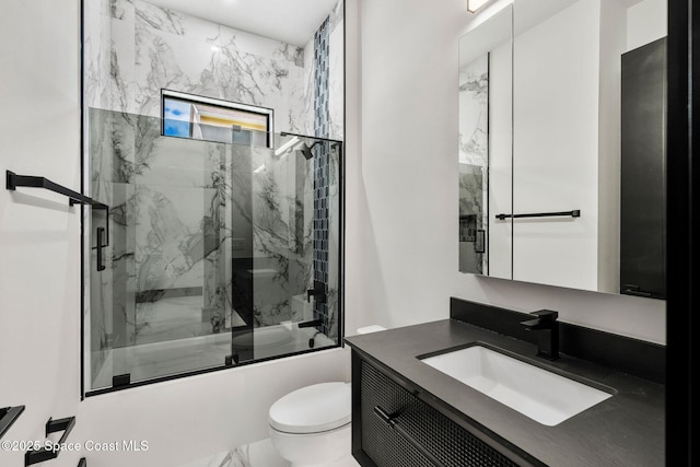 full bathroom with toilet, marble finish floor, vanity, and shower / bath combination with glass door