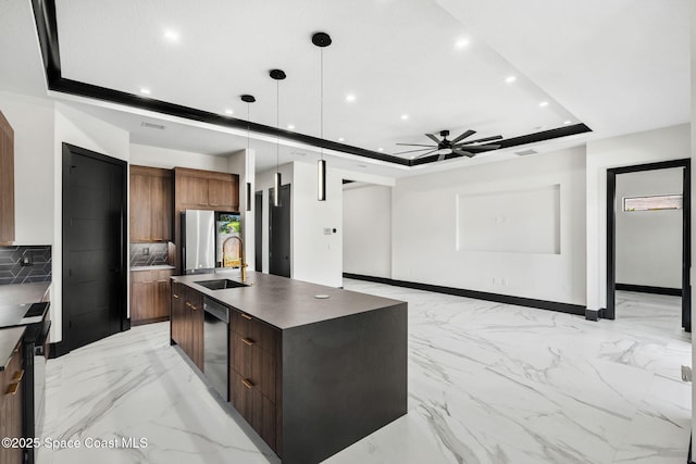 kitchen with dishwashing machine, refrigerator, a tray ceiling, modern cabinets, and recessed lighting