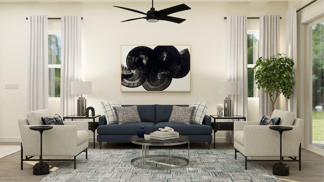 living room with baseboards, a ceiling fan, a healthy amount of sunlight, and wood finished floors