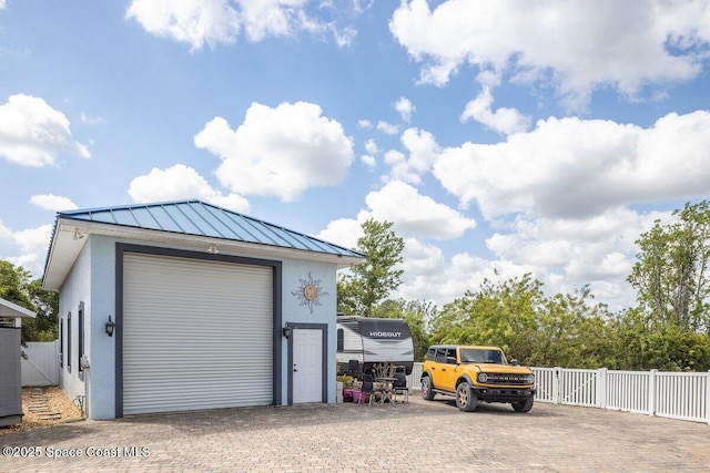 3824 Luxury Ln, Titusville, FL 32796 - detached garage with a gate and driveway