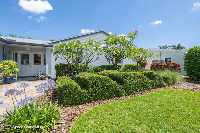 190 Harwood Ave, Satellite Beach, FL 32937 - view of property exterior with a yard and stucco siding