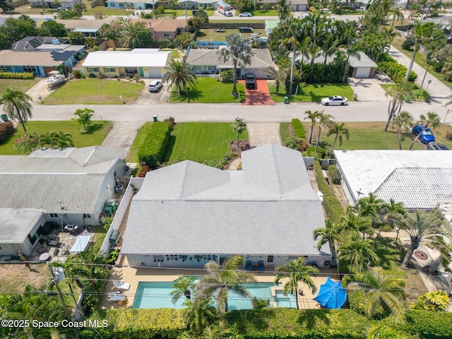 190 Harwood Ave, Satellite Beach, FL 32937 - aerial perspective of suburban area featuring a pool area