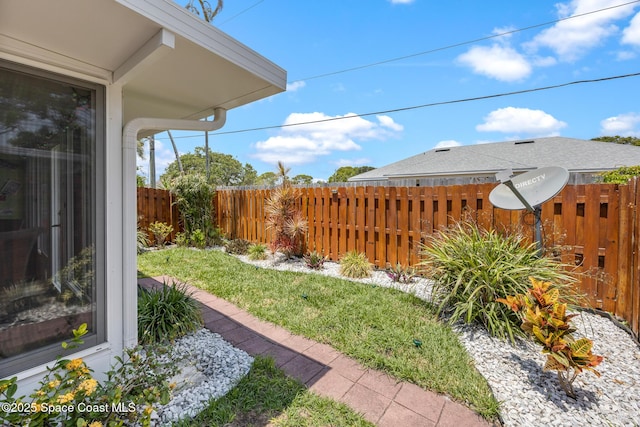 412 Sailfish Ave Unit 16, Cape Canaveral, FL 32920 - view of yard featuring fence