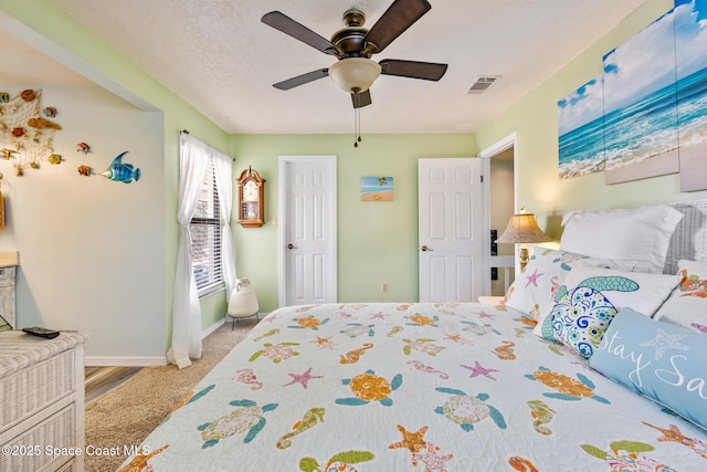 412 Sailfish Ave Unit 16, Cape Canaveral, FL 32920 - carpeted bedroom with baseboards and a ceiling fan