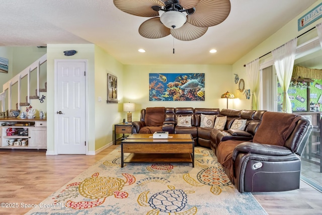 412 Sailfish Ave Unit 16, Cape Canaveral, FL 32920 - living room featuring wood finished floors, stairs, a ceiling fan, recessed lighting, and baseboards